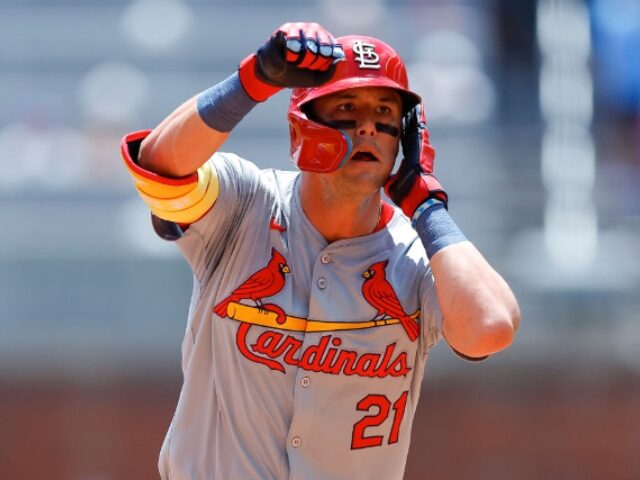 ATLANTA, GEORGIA - JULY 21: Lars Nootbaar #21 of the St. Louis Cardinals reacts after hitt