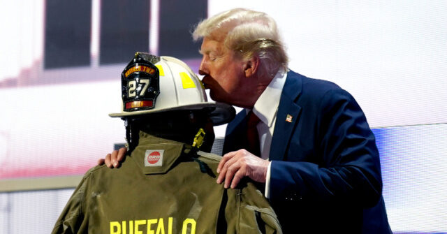 Trump Hugs and Kisses Uniform of Sniper Victim Corey Comperatore