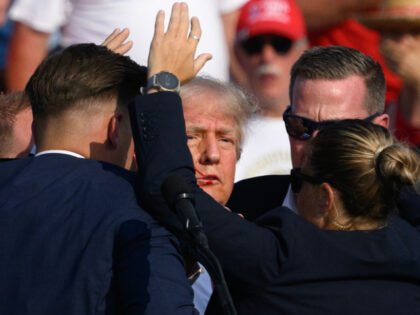 BUTLER, PENNSYLVANIA - JULY 13: Secret Service agents surround Republican presidential can