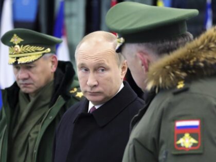 Russian President Vladimir Putin, center, speaks to Russian Strategic Missile Troops Comma