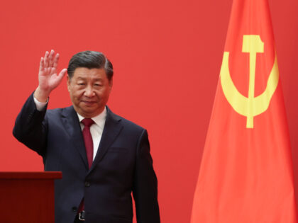 BEIJING, CHINA - OCTOBER 23: Chinese President Xi Jinping waves during the meeting between