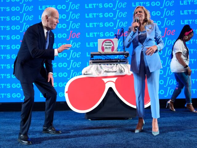 President Joe Biden, left, and first lady Jill Biden speak at a presidential debate watch