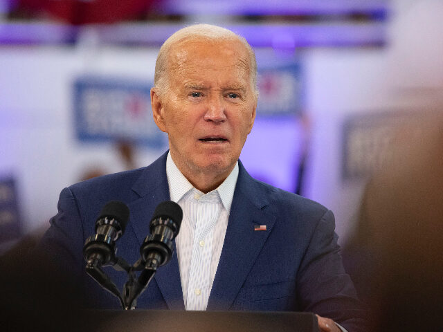 DETROIT, MICHIGAN - JULY 12: President Joe Biden campaigns at Renaissance High School on J