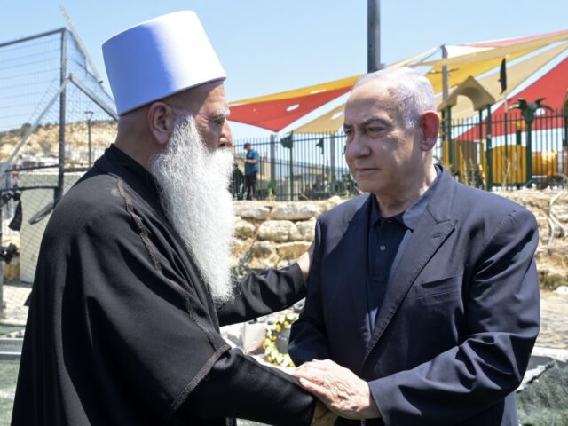 Netanyahu Druze leader (Koby Gideon / GPO) Israeli Prime Minister Benjamin Netanyahu offers condolences to a Druze leader in Majdal S