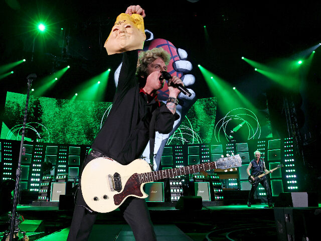 Green Day's Billie Joe Armstrong Holds Up Rubber Donald Trump Head at ...