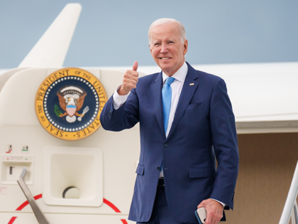 President Joe Biden boards Air Force One at Bradley International Airport in Windsor Locks