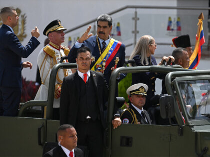 TOPSHOT - Venezuela's President Nicolas Maduro arrives to a military parade to celebrate t
