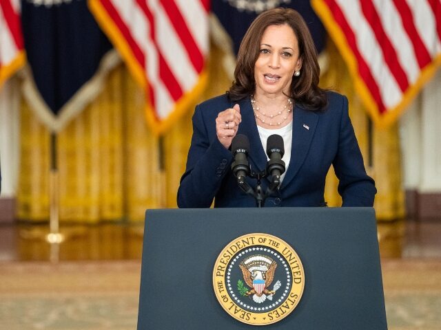 President Joe Biden looks on as Vice President Kamala Harris delivers remarks on the passi