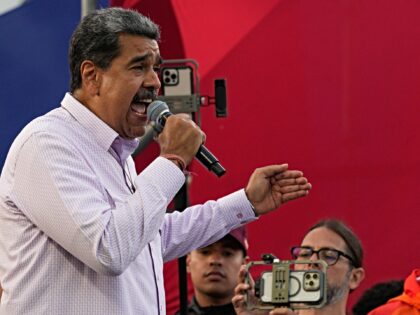 Venezuelan President Nicolas Maduro speaks to supporters during a campaign rally on the Bo