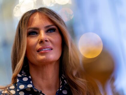 Former first lady Melania Trump listens as former President Donald Trump announces he is r