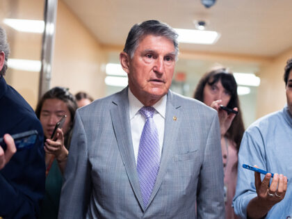 UNITED STATES - JULY 8: Sen. Joe Manchin, D-W.Va., is questioned by reporters about the ca