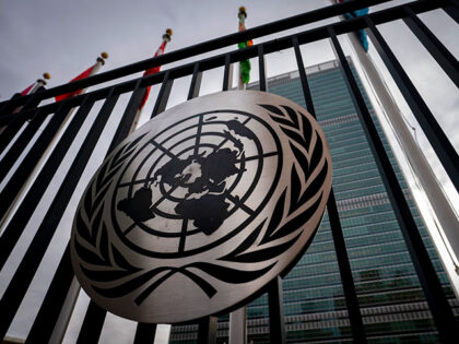 The symbol of the United Nations is displayed on the main gate outside UN headquarters, Fe