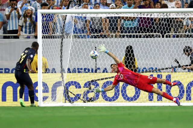 Argentina keeper Emiliano Martinez denied Ecuador's Alan Minda with a brilliant save in th