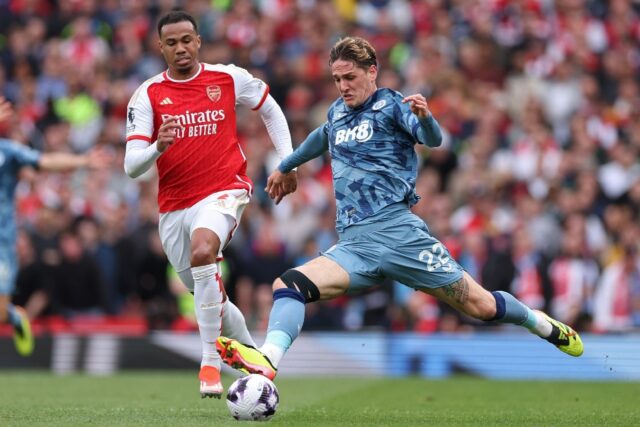 Arsenal's Brazilian defender Gabriel Magalhaes (L) vies with Aston Villa's Italian midfiel