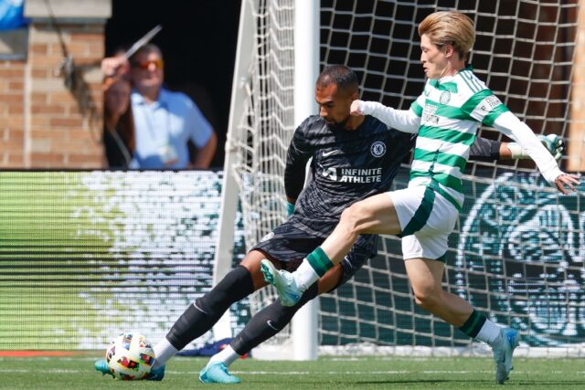 Celtic's Japanese forward Kyogo Furuhashi, right, pressures Chelsea's Spanish goalkeeper R