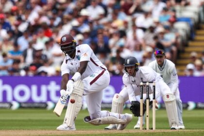 Counter-attack: West Indies' Jason Holder (L) hits out against England in the third Test a