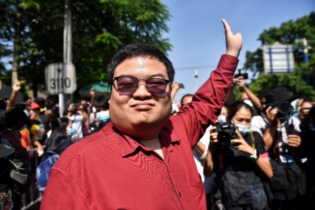 Democracy activist Parit 'Penguin' Chiwarak (pictured in 2020) has been sentenced to two y