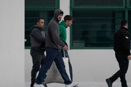 French national rugby players Hugo Auradou (2nd from left) and Oscar Jegou (in green) were