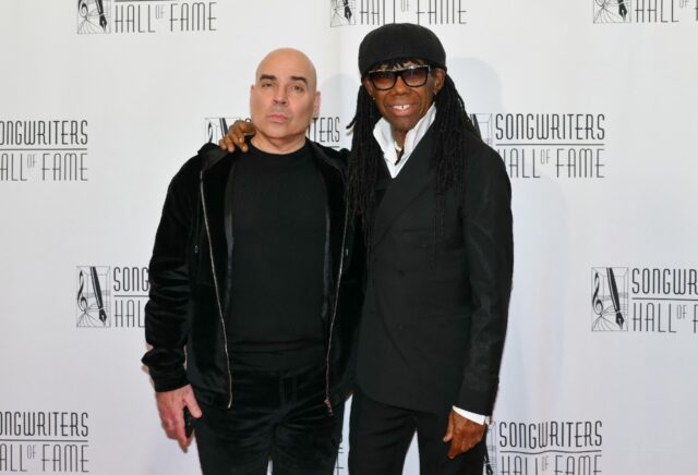 Hipgnosis executive Merck Mercuriadis (L) and co-founder Nile Rodgers attend the Songwrite