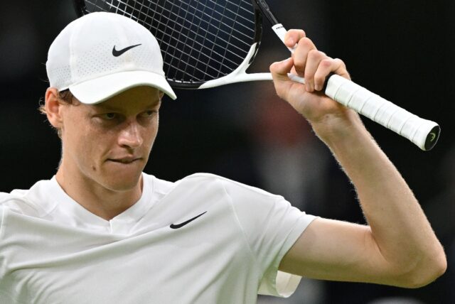 Italy's Jannik Sinner celebrates victory against compatriot Matteo Berrettini at Wimbledon