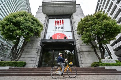 Japanese markets started higher on Friday with Tokyo's benchmark Nikkei 225 index crossing