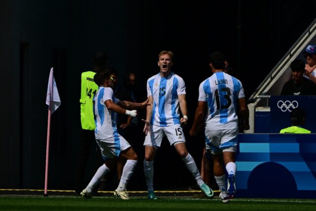 Luciano Gondou (C) celebrates with teammates after scoring Argentina's second goal against