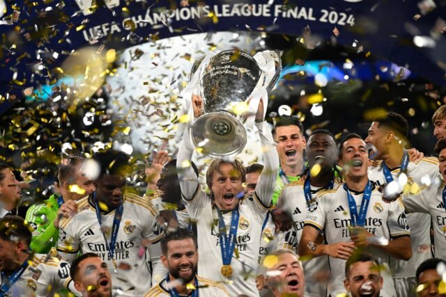 Luka Modric (C) lifted his sixth Champions League title after Real Madrid beat Borussia Do