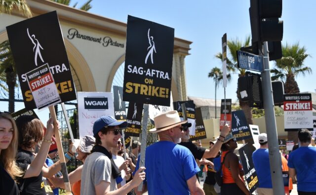 Members of the SAG-AFTRA actors' union demonstrate outside Paramount Studios in Los Angele