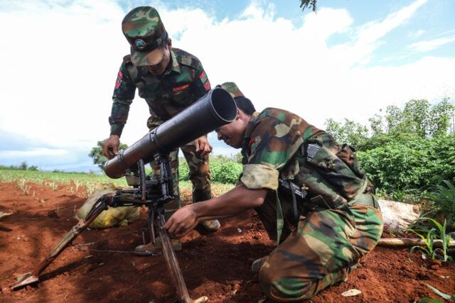 Members of the TNLA set up their weapons amid clashes with Myanmar's military in northern