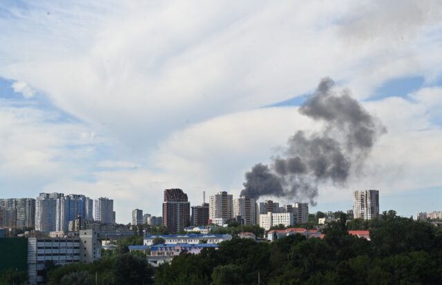 The photograph shows a black smoke over the Ukrainian capital of Kyiv on July 8, 2024, ami