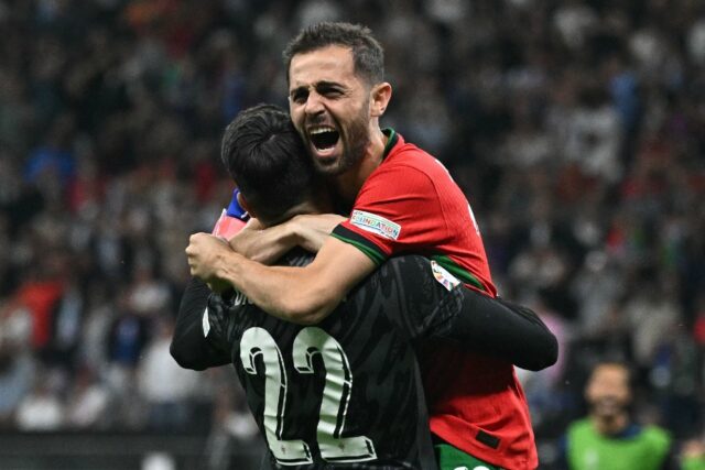 Portugal goalkeeper Diogo Costa (left) saved three penalties in their shootout win over Sl