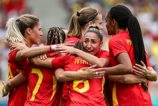 Spain players celebrate after scoring during their 2-1 win over Japan in Nantes on Thursda