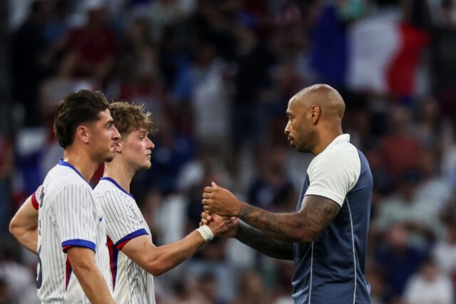 Thierry Henry (R) and his France players are hoping to see off Argentina and carry on towa