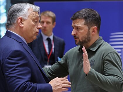 Ukraine's President Volodymyr Zelenskyy, right, speaks with Hungary's Prime Minister Vikto