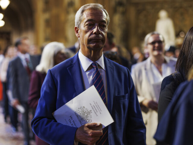 Reform MP Nigel Farage walks through the Central Lobby at the Palace of Westminster ahead