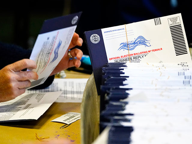 Chester County, Pa., election workers process mail-in and absentee ballots at West Chester