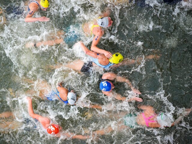 FILE - Australia's Natalie Van Coevorden (15), Belgium's Claire Michel (5) and Ekaterina S