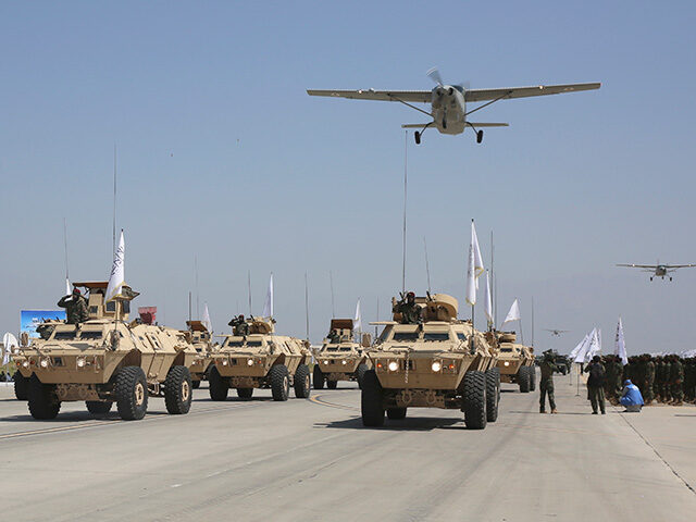 Taliban Military Vehicles are displayed during a military parade to mark the third anniver