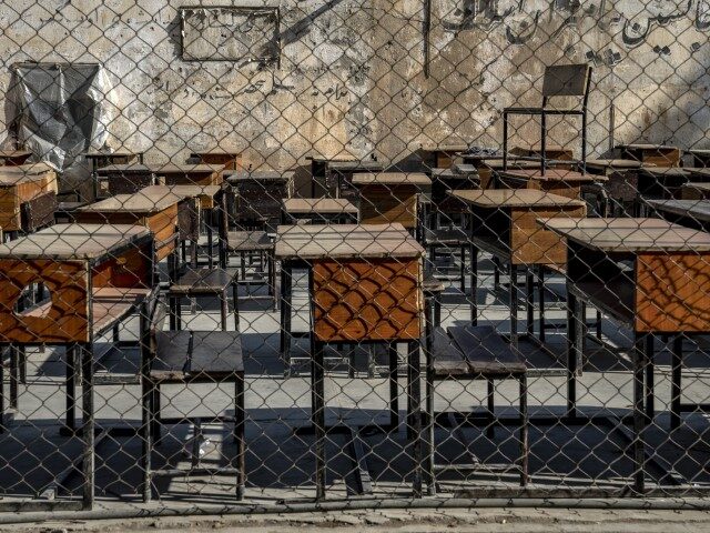 FILE - The benches of a school sit empty in Kabul, Afghanistan, on Dec. 22, 2022. Two year