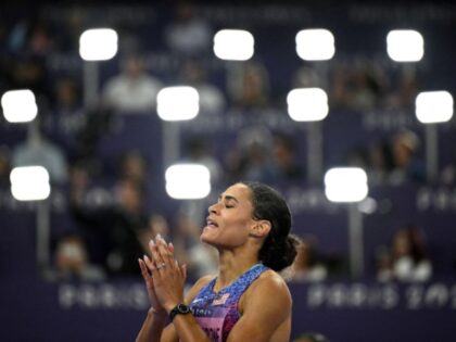 Gold medallist US' Sydney Mclaughlin-Levrone celebrates winning the women's 400m