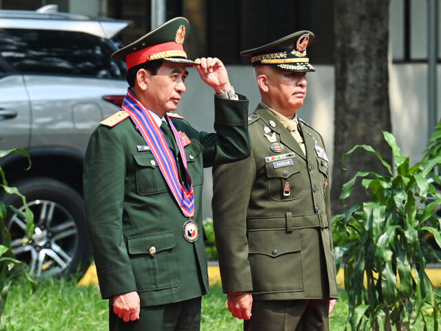 Deputy Chief of Staff of the Armed Forces of the Philippines Charlton Gaerlan (R) receives