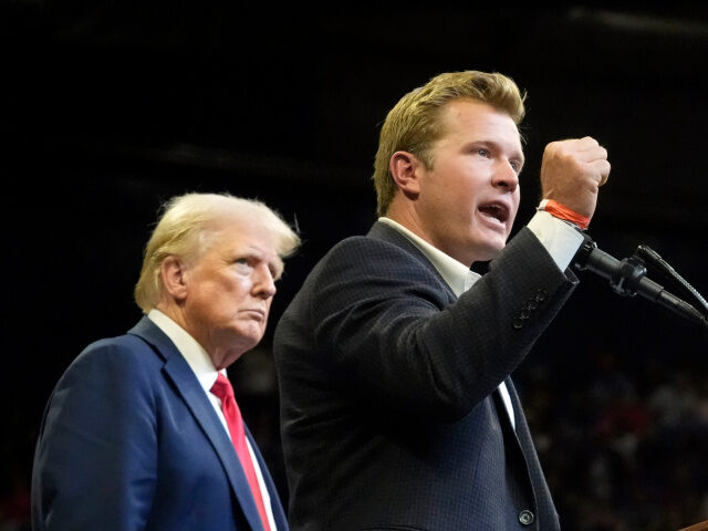 Republican presidential nominee former President Donald Trump listens as Montana Senate ca