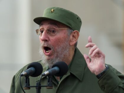 Former Cuban President Fidel Castro delivers a a speech during the commemoration of the 50