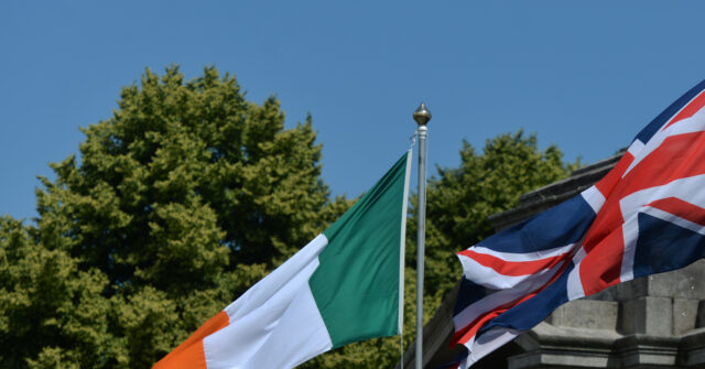 UK and Irish Flags Fly Side by Side at Belfast Anti-Migration Rally
