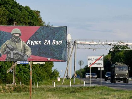 A sign reading as "Kursk for you!" with the Z letter, a tactical insignia of Russian troop