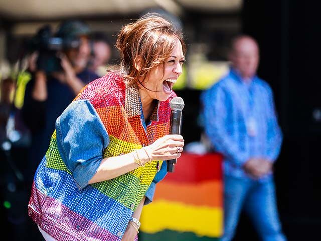 Senator Kamala Harris greets the crowd at the annual Pride Parade at Civic Center in San F