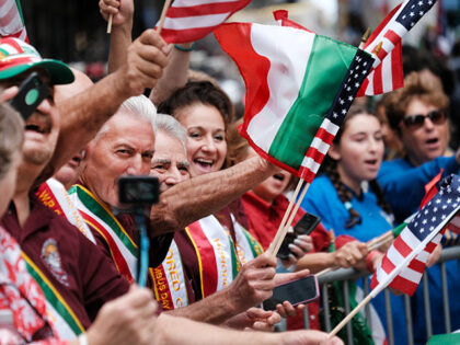 People watch the annual Columbus Day Parade in Manhattan after it was canceled last year d