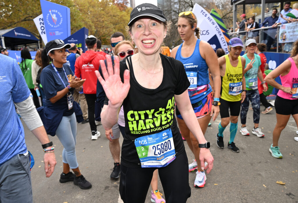 NEW YORK, NEW YORK - NOVEMBER 06: Chelsea Clinton finishes the 2022 TCS New York City Marathon on November 06, 2022 in New York City. (Photo by Bryan Bedder/New York Road Runners via Getty Images)