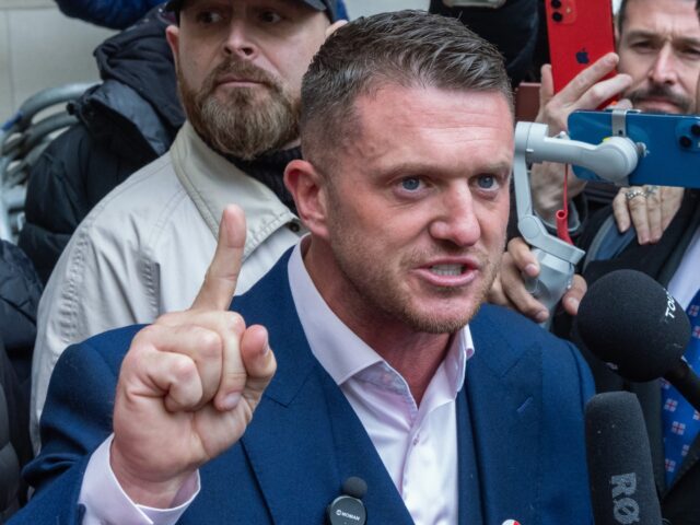 Far-right activist Stephen Yaxley-Lennon, better known as Tommy Robinson, speaks outside W