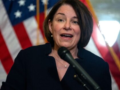 Walz - WASHINGTON, DC - MAY 22: Sen. Amy Klobuchar (D-MN) speaks during a news conference